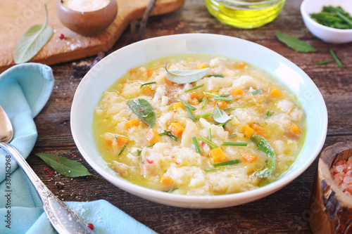 Italian cuisine. Pancotto: bread soup with sage and grated Parmesan cheese