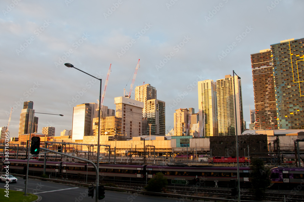MELBOURNE, AUSTRALIA - JULY 26, 2018: Southern Cross train station and Melbourne Australia skyscrapers background