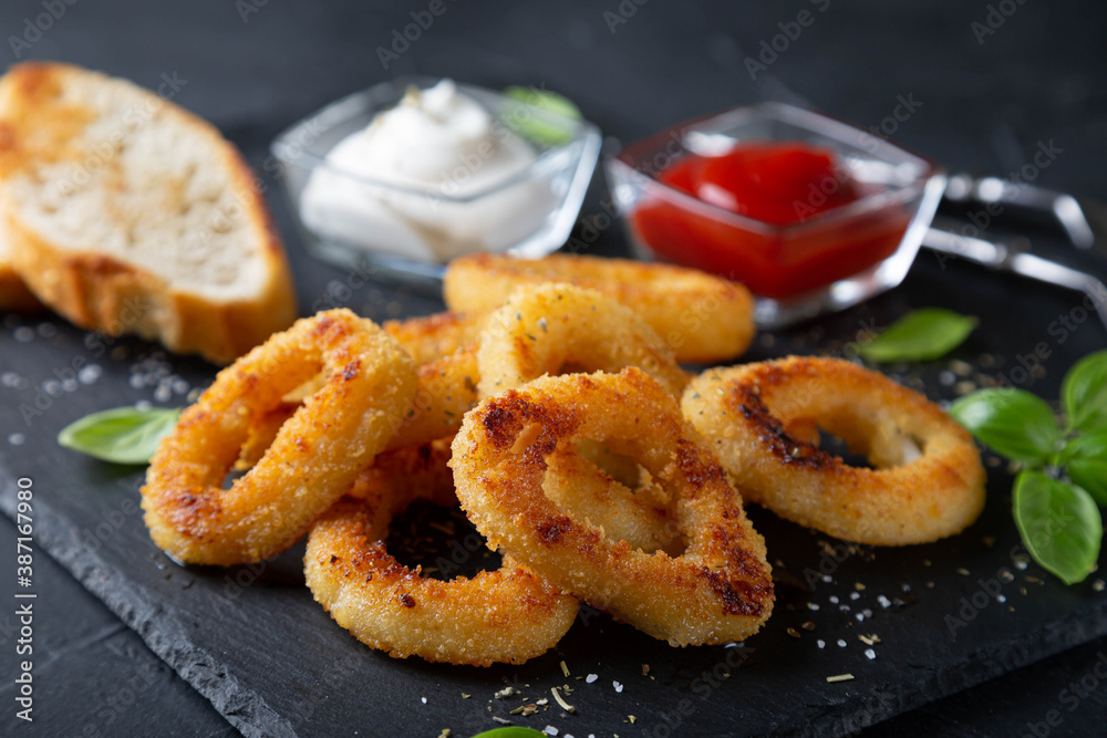 Squid rings or onion rings with sauces Squid rings or onion rings with sauces