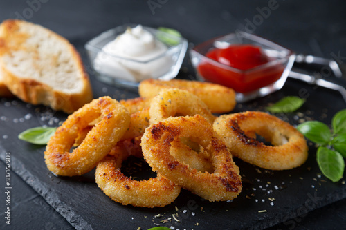 Squid rings or onion rings with sauces