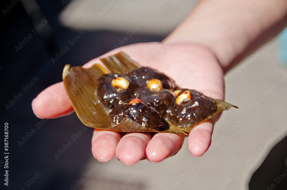 Traditional sweet dessert brown sugar stuffed with almond at Tai O fisherman village in Hong Kong Traditional sweet dessert brown sugar stuffed with almond at Tai O fisherman village in Hong Kong