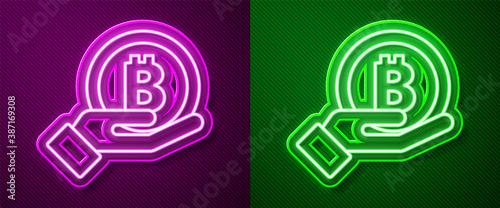 Glowing neon line Hand holding Bitcoin icon isolated on purple and green background. Blockchain technology, digital money market, cryptocoin wallet. Vector.