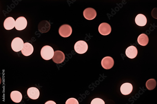 gray beautiful party glitter light blur pattern in concert blur on black sky.
