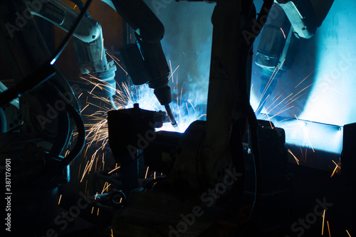Welding robots movement in a car factory © taaee
