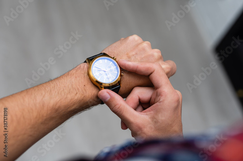 men's hand with a watch.