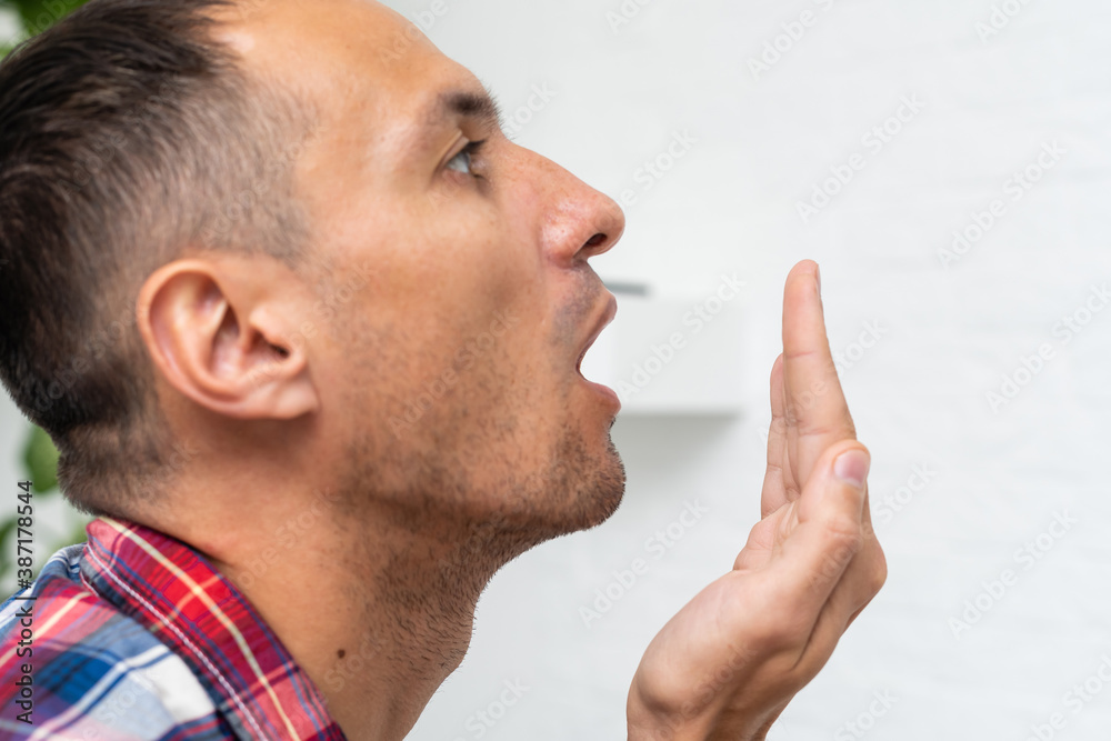 Obraz premium Headshot of smell something bad face man