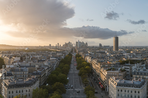 Paris city skyline, La Defense and Champs Elysées at dusk