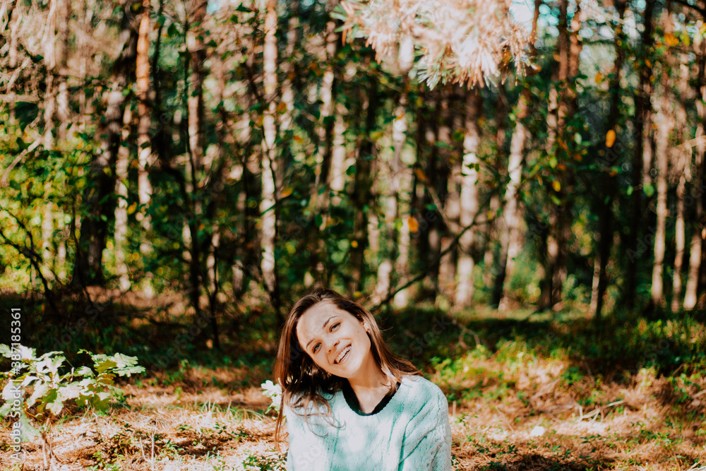 portrait of a girl with blue eyes in a turquoise sweater portrait of a girl with blue eyes in a turquoise sweater