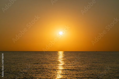 sunset at sea during calm weather © Aleksandr
