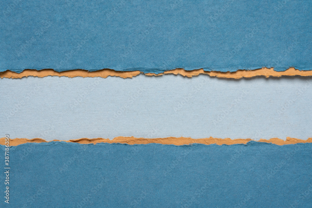 paper abstract in blue and orange with a copy space - sheets of handmade cotton rag paper, blank web banner paper abstract in blue and orange with a copy space - sheets of handmade cotton rag paper, blank web banner