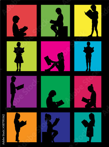Silhouette of a child reading a book at.