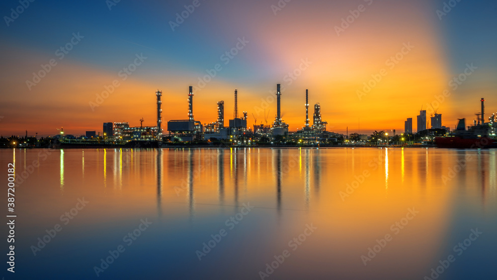 Oil refinery and sunrise at the Chao Phraya River, Thailand, petrochemical Industrial, oil refinery and oil industry, Sep 27, 2018.