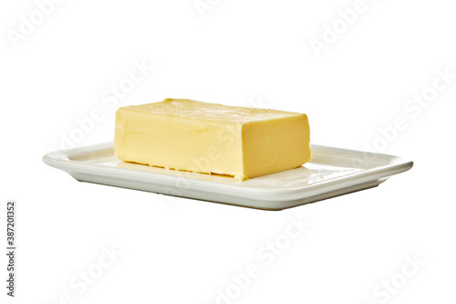 butter in white ceramic butter-dish on white background