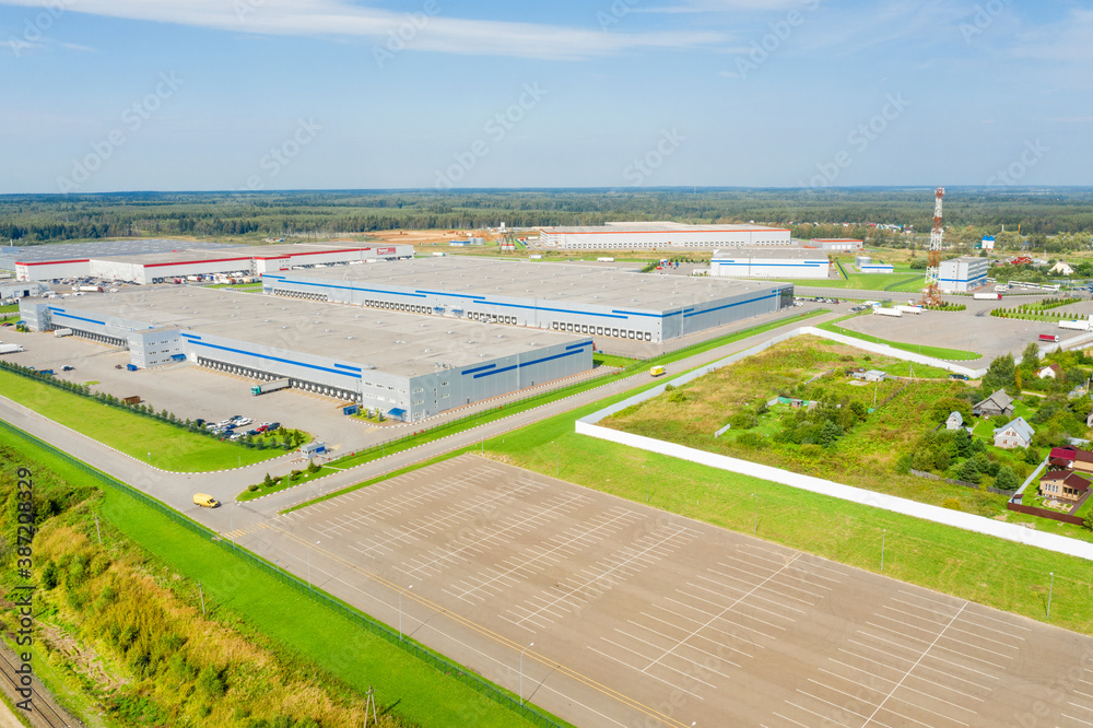 Aerial view of warehouse buildings of business park in countryside Aerial view of warehouse buildings of business park in countryside