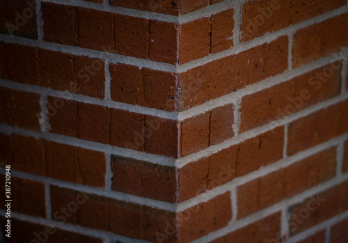 The Edge of a Textured Red Brick Wall
