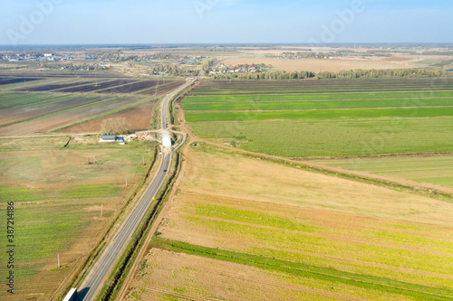 Top view of agricultural fields in autumn day