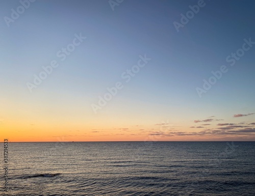 sunset over the sea © Atsamaz