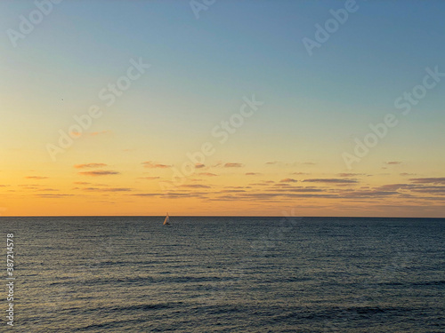 sunset over the sea © Atsamaz