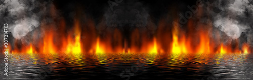 Fire on a black background, smoke, reflection of fire in the water.