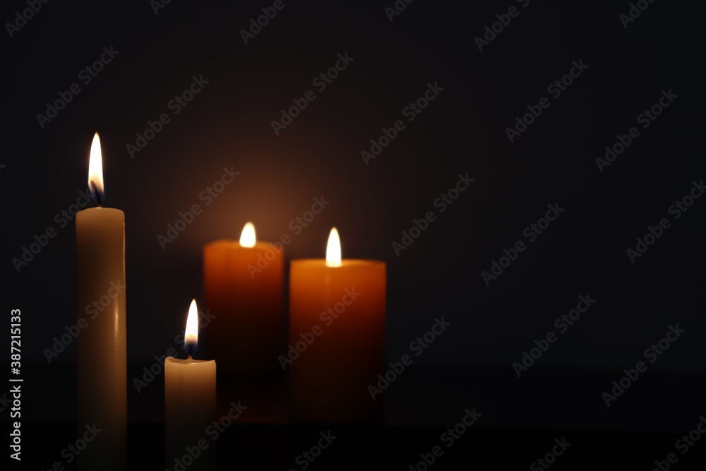 Candle black background of mourning funeral moment of silence Candle black background of mourning funeral moment of silence
