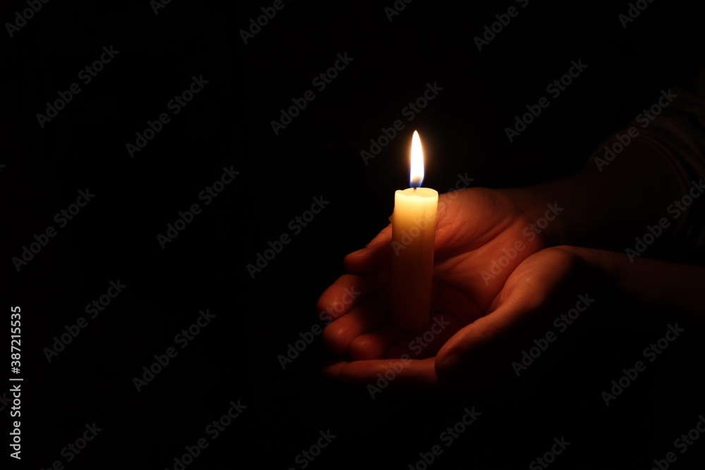 Candle black background of mourning funeral moment of silence Candle black background of mourning funeral moment of silence