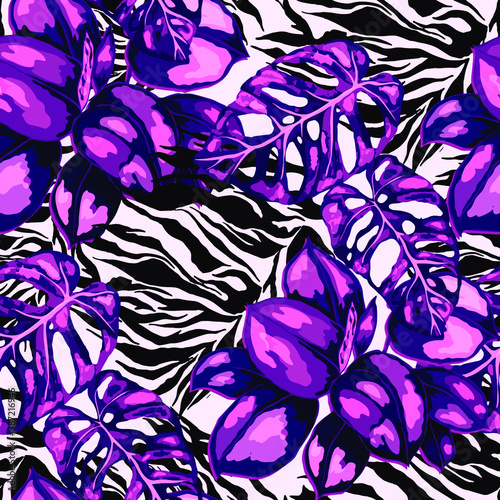 Tropical seamless pattern on animalistic texture. Jungle exotic summer print. Summer tropical leaf. Tropical flower fashion pattern. Floral tropic illustration. Vector seamless pattern.	