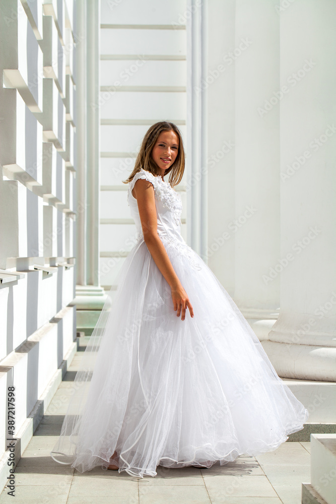 Young beautiful girl in ballroom prom dress Young beautiful girl in ballroom prom dress