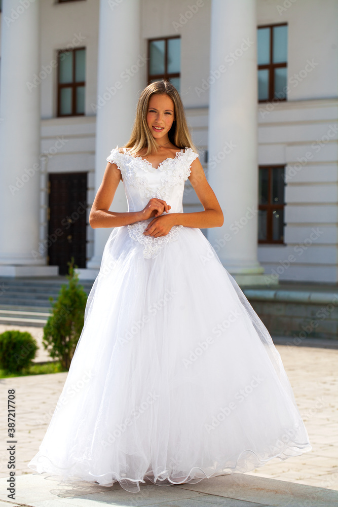 Young beautiful girl in ballroom prom dress Young beautiful girl in ballroom prom dress
