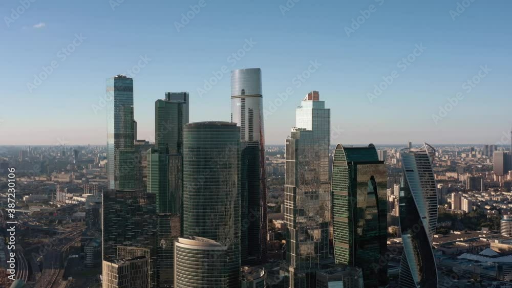Moscow city glass skyscrapers drone zoom in shot. Famous Moscow International Business Center during a sunny day, daylight blue sky, camera moving Moscow city glass skyscrapers drone zoom in shot. Famous Moscow International Business Center during a sunny day, daylight blue sky, camera moving
