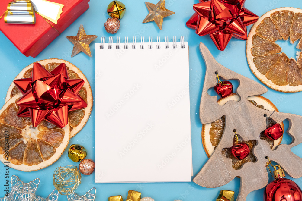 Christmas composition. Gifts and fur tree on blue background. Top view copy space. Nature New Year concept Christmas composition. Gifts and fur tree on blue background. Top view copy space. Nature New Year concept