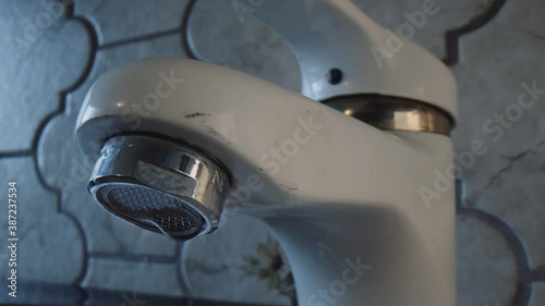 leaky and dripping bathroom faucet