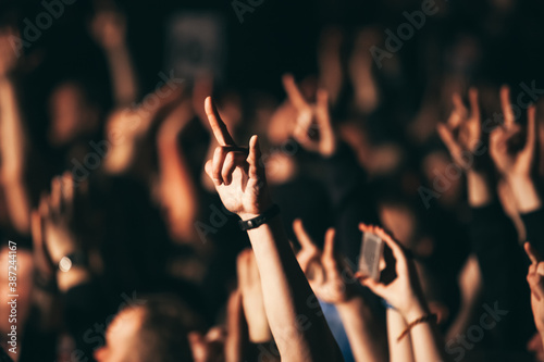 Fotografie Devil's Horns At A Rock Concert. Heavy metal rock sign.