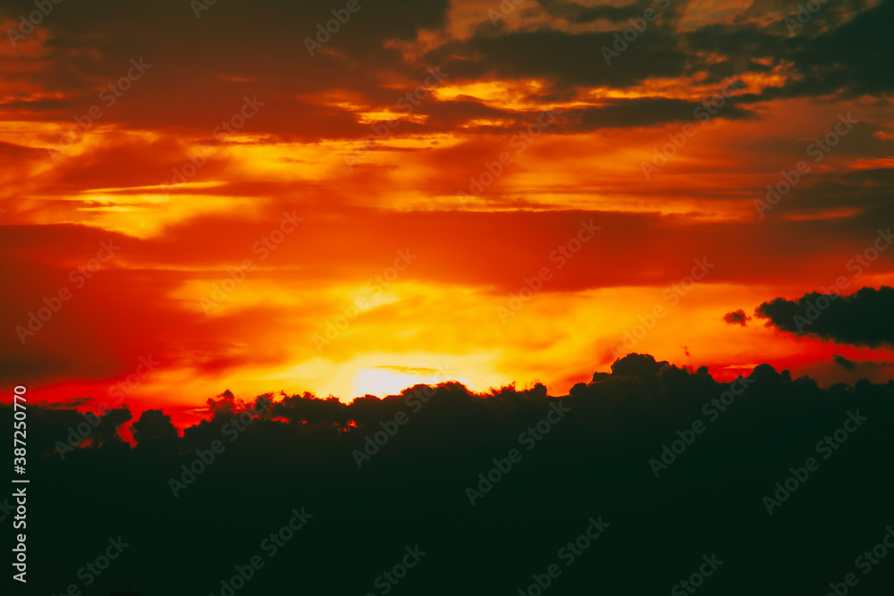 Dark clouds and red sky in the twilight Dark clouds and red sky in the twilight