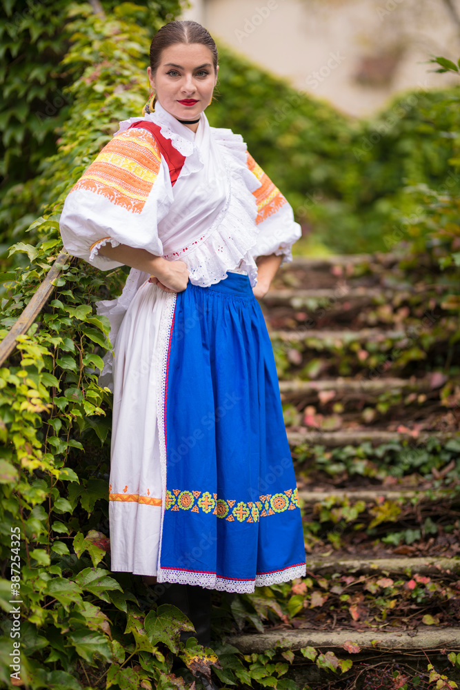 Beautiful woman wearing traditional Eastern Europe folk costumes. 
Slovak folklore.