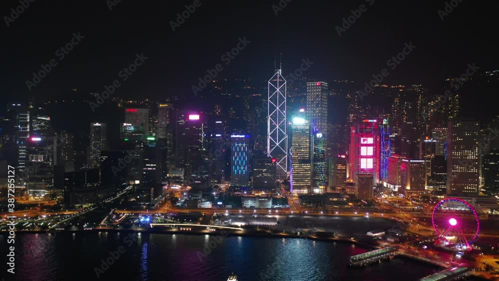 night time illuminated hong kong city downtown traffic bay aerial panorama 4k night time illuminated hong kong city downtown traffic bay aerial panorama 4k