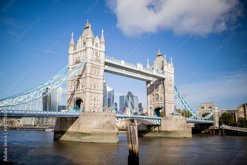 Landscape View of Tower Bridge with a Cityscape and Blue Sky as Background
