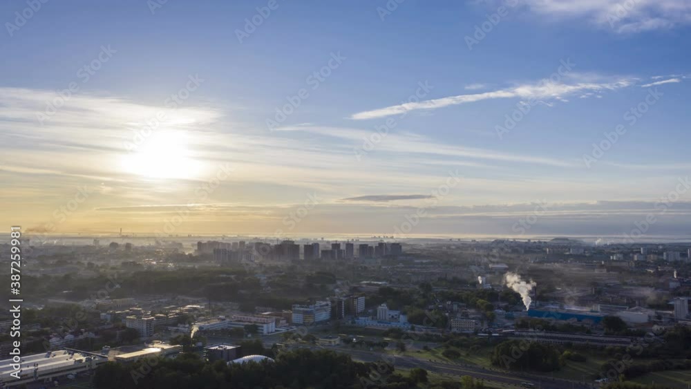 Aerial bird-eye view cityscape on sunrise, hyperlapse. View of the morning townscape of Minsk in the fog. Aerial bird-eye view cityscape on sunrise, hyperlapse. View of the morning townscape of Minsk in the fog.