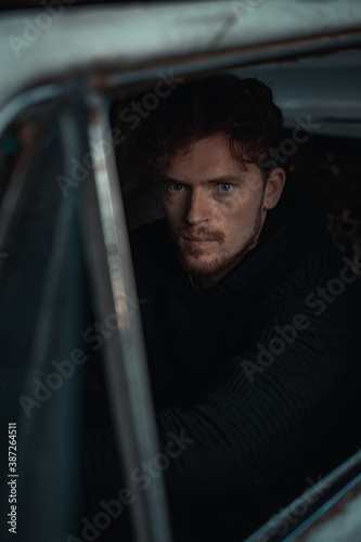 Portrait of a Guy Sitting in an Old Car © Женя Шаповалов