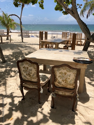 table and chairs on a beach