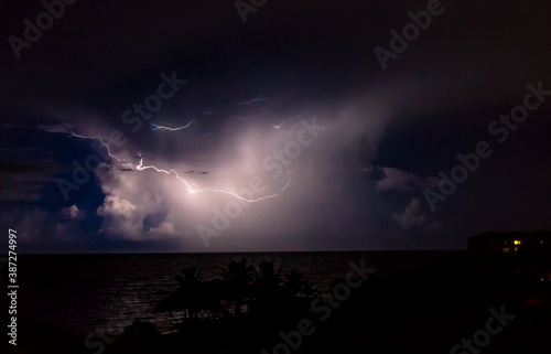 Lightning Makes a Smiling face over the ocean