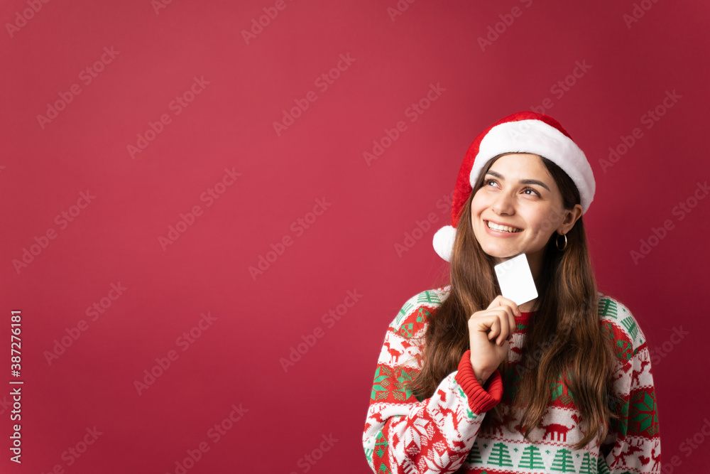 Fototapeta premium Thinking about what to buy on Christmas