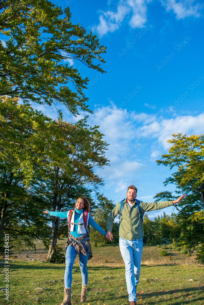 Happy couple On an awesome outdoor adventure Happy couple On an awesome outdoor adventure