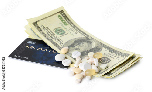 Drugs and money on white ba...