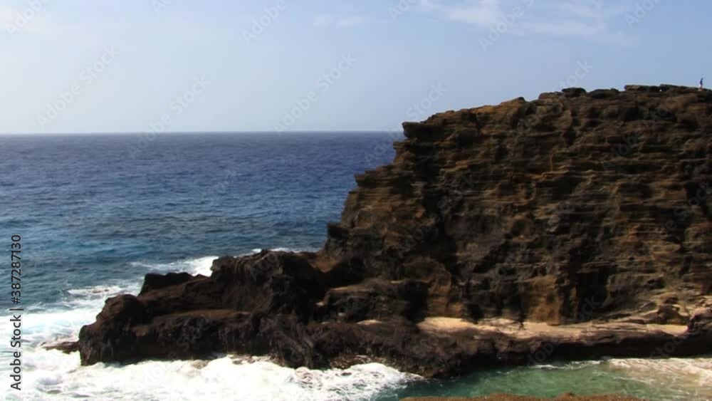 The steep rocky shore at Halona Beach Cove and Blowhole, Oahu, Hawaii. The steep rocky shore at Halona Beach Cove and Blowhole, Oahu, Hawaii.