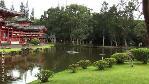 The Byodo-In Temple and the small pond in front, in the Valley of the Temples Memorial Park Kahaluu, Oahu, Hawaii photo