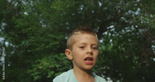 Cute little boy dancing and jumping. Red cinema Camera. Slow motion 4k