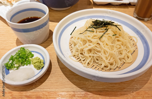 Close up Japanese Cold Noodle or Zaru Ramen on Wooden Table