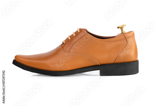 Men fashion yellow leather oxford shoe with shoe tree (shape supporter) isolated on white background. side view