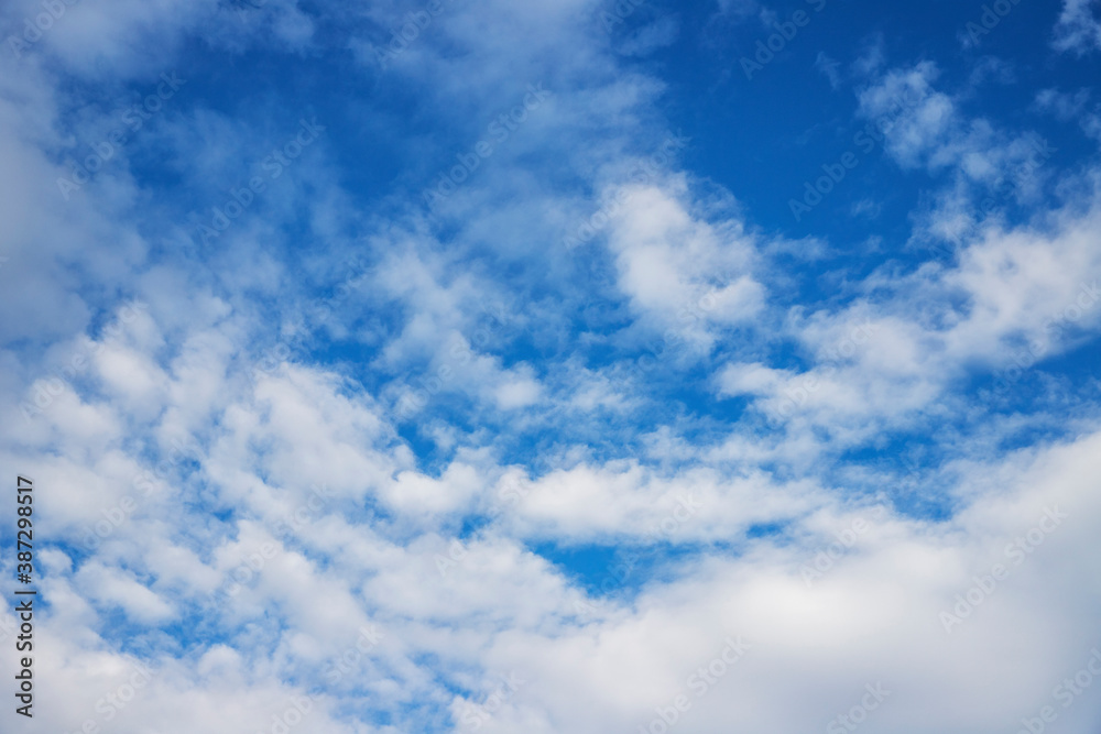 Blue sky background with tiny clouds. Blue sky background with tiny clouds.