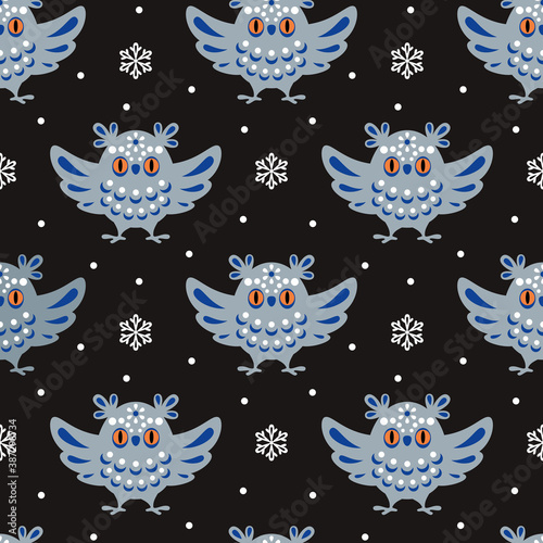 Christmas seamless pattern with cute owl in ethnic style. Colorful vector background